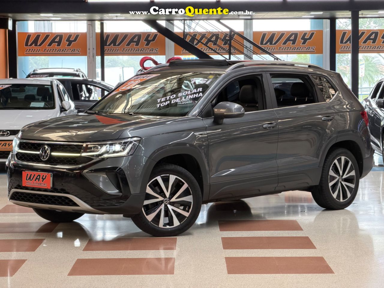 VOLKSWAGEN TAOS 1.4 250 TSI TOTAL HIGHLINE 2022 - Loja